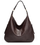 Brown leather handbag on a white background