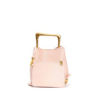 Pink handbag with gold accents on a white background