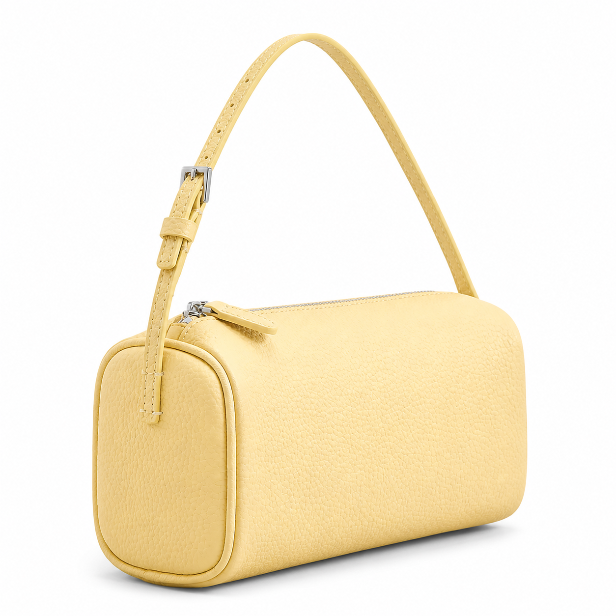 A light yellow pebbled leather shoulder bag with a single matching shoulder strap and a silver zipper, shown on a plain white background.