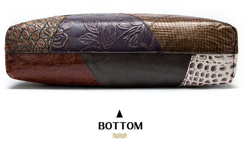Multicolored leather clutch with embossed patterns on a white background