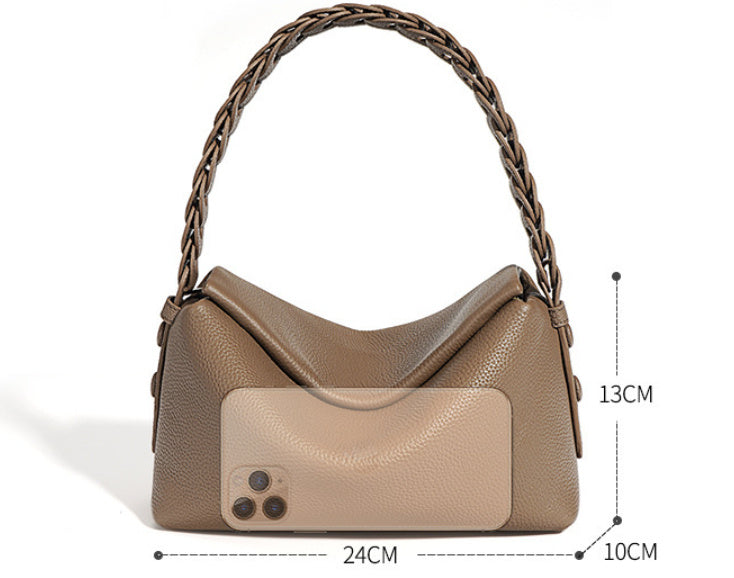 Beige handbag with braided handle and measurements on a white background