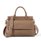 Brown leather handbag with gold accents on a white background