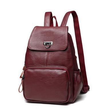 Maroon backpack with a silver buckle on a white background