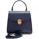 Navy blue handbag with a decorative clasp on a white background
