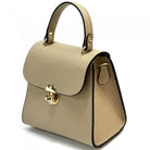 Beige handbag with gold accents on a white background