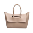 Beige handbag with a handle on a white background