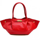 Red handbag with gold accents on a white background