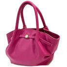 Pink handbag on a white background