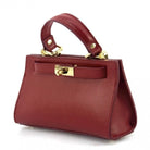 Red handbag with gold accents on a white background