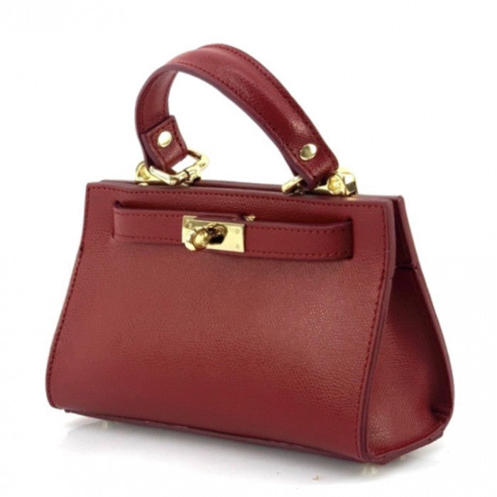 Red handbag with gold accents on a white background