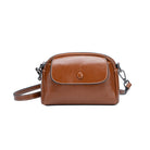 Brown leather handbag with a chain strap on a white background
