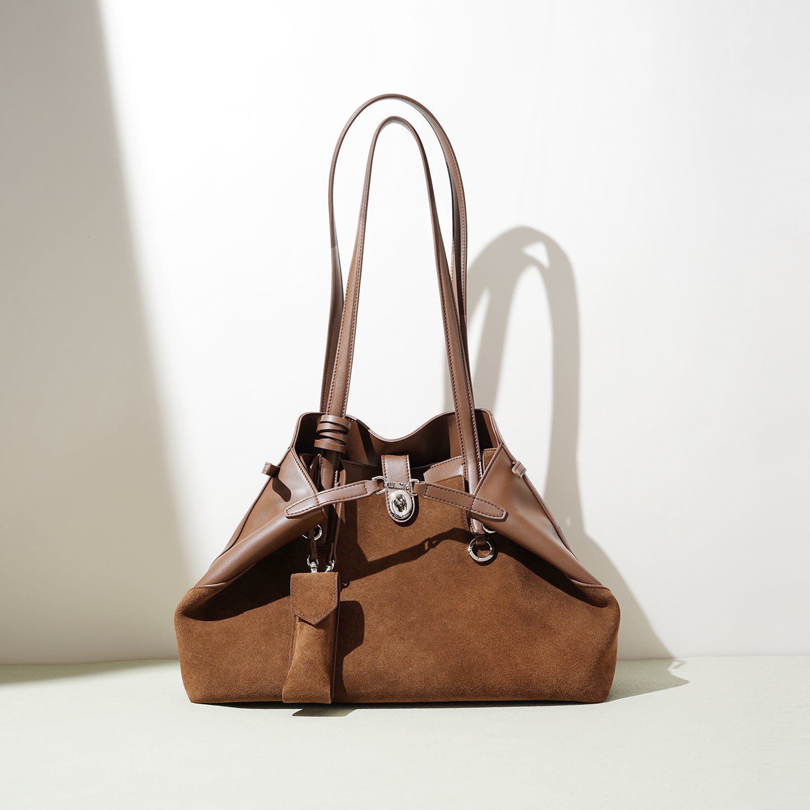 Brown handbag on a white background