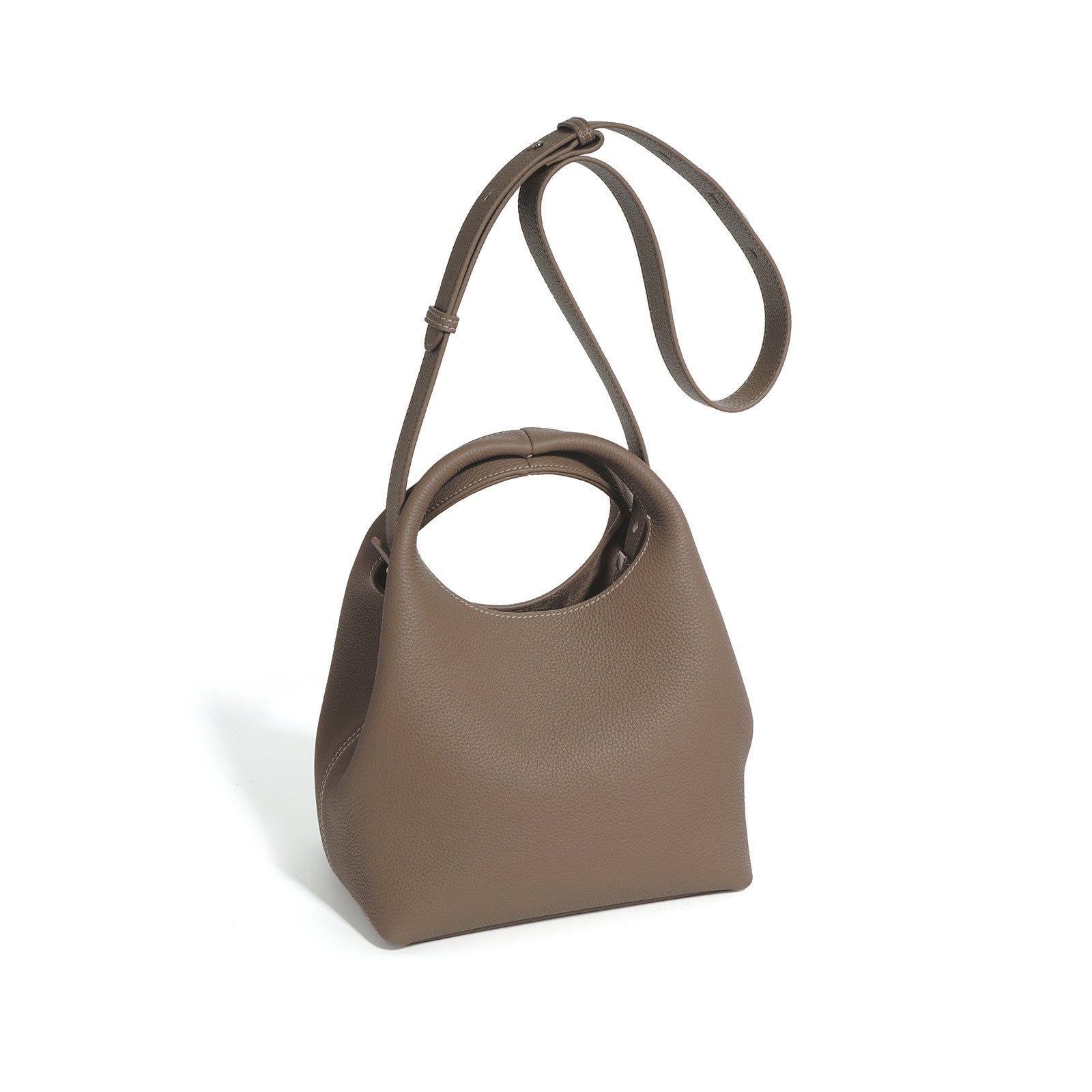 Brown handbag with a strap on a white background