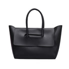 Black handbag on a white background