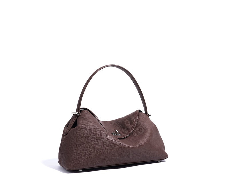 Brown handbag on a white background
