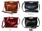 Four leather handbags in brown, royal blue, red, and black on a white background.